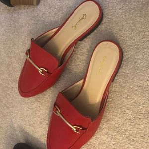 Red slip on shoes.